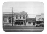 Downtown Dixon in 1946 - View of Bank of America - Quick Lunch Café , Doctor's office, Weiglels Garage, B and first street, east side.